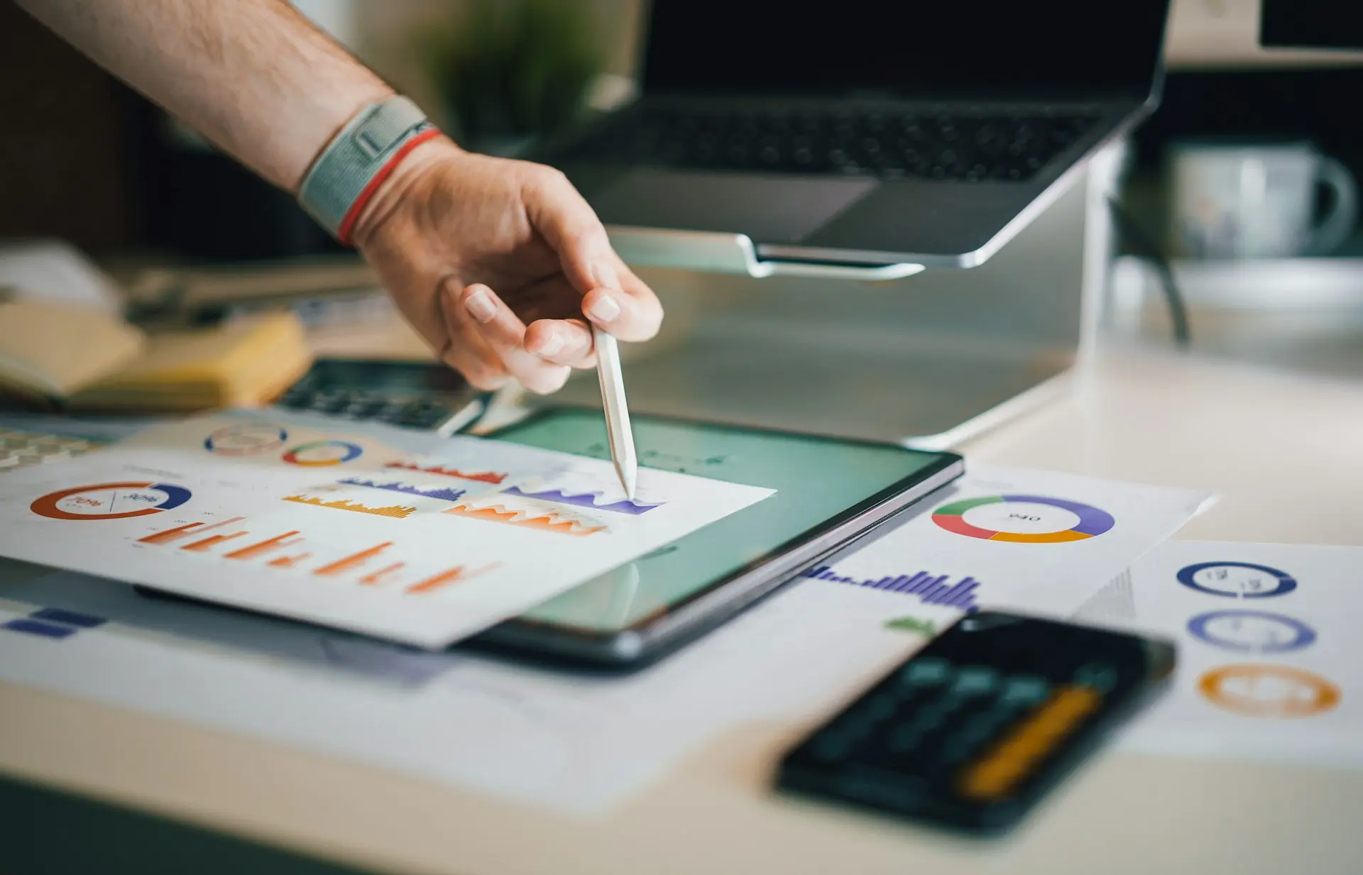 a person is writing on a piece of paper